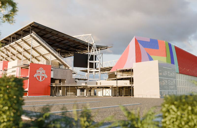 North side of Toronto Stadium at Exhibition Place with an open-air seating section and vibrant mural-covered building